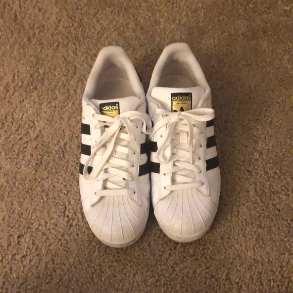 adidas Shoes - adidas White and Black Superstar Sneakers